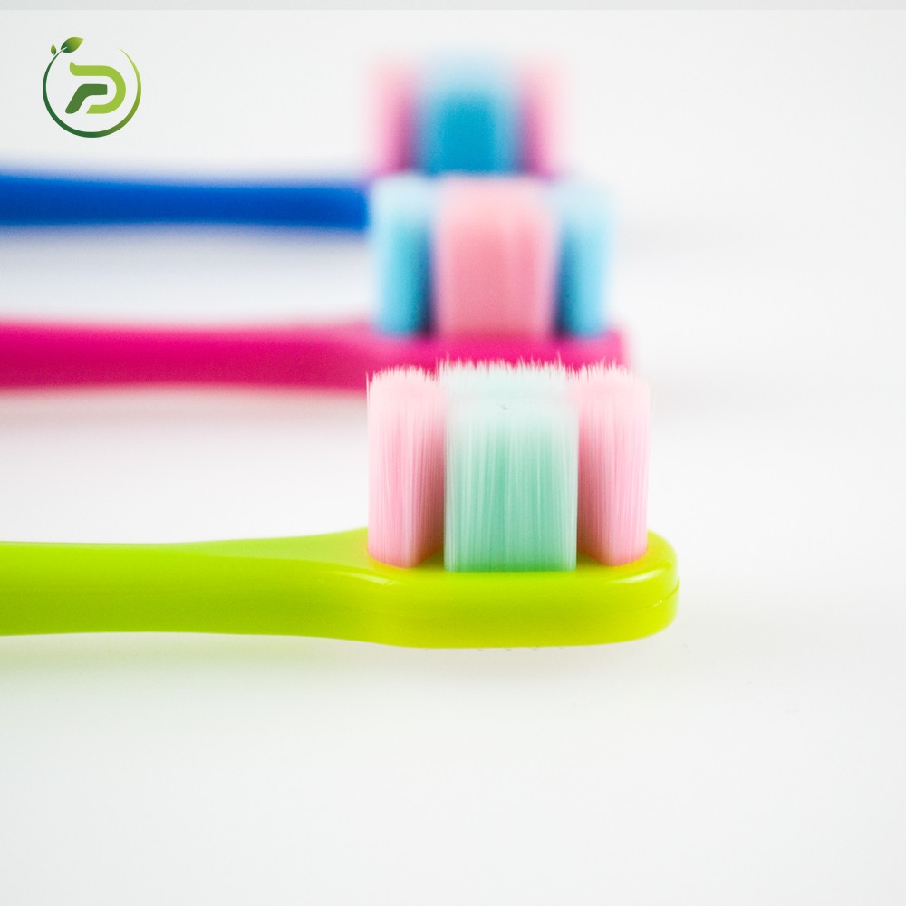 Wholesale Children Nylon Curve Bristles Tooth Brush Anti-Slip Handle Custom Logo Kids Manual Toothbrush